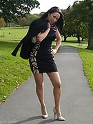 A tight black dress and creamy high stiletto heels gets this dark haired beauty in the mood for some outdoor fun