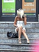Our creepy camera man sees Jessa Rhodes, a blonde bombshell in a body hugging white dress, nude pantyhose, and glittery high heels.