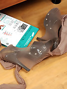 Hottie fondling her pussy in expensive hosiery before getting fucked hard