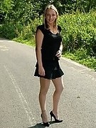 Stunning blonde in pantyhose high heels and little dress in public